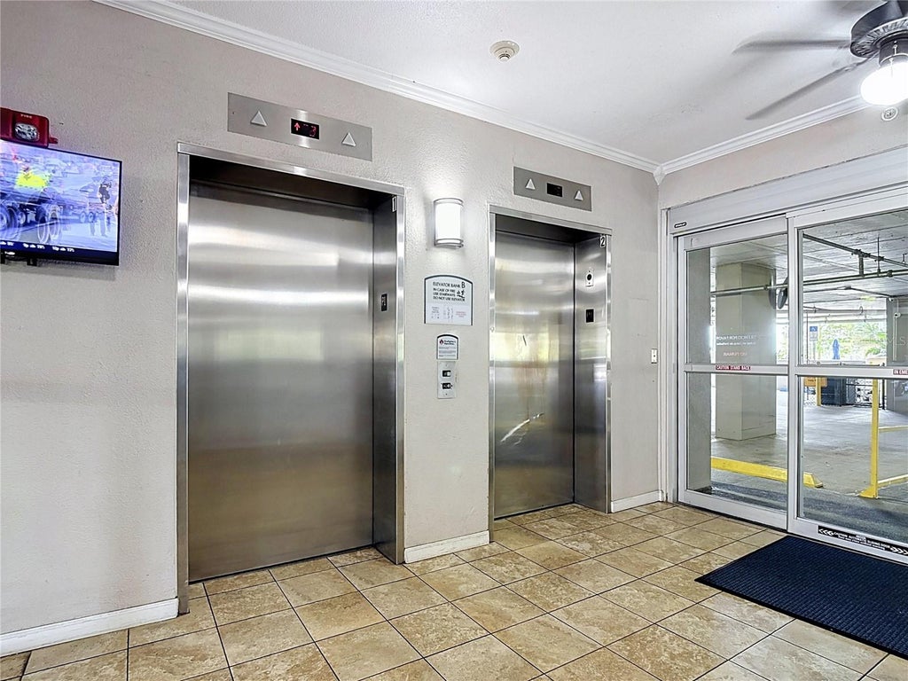 Photo of 13427 Blue Heron Beach Drive #402, Orlando, FL 32821 (MLS # O6438142)
