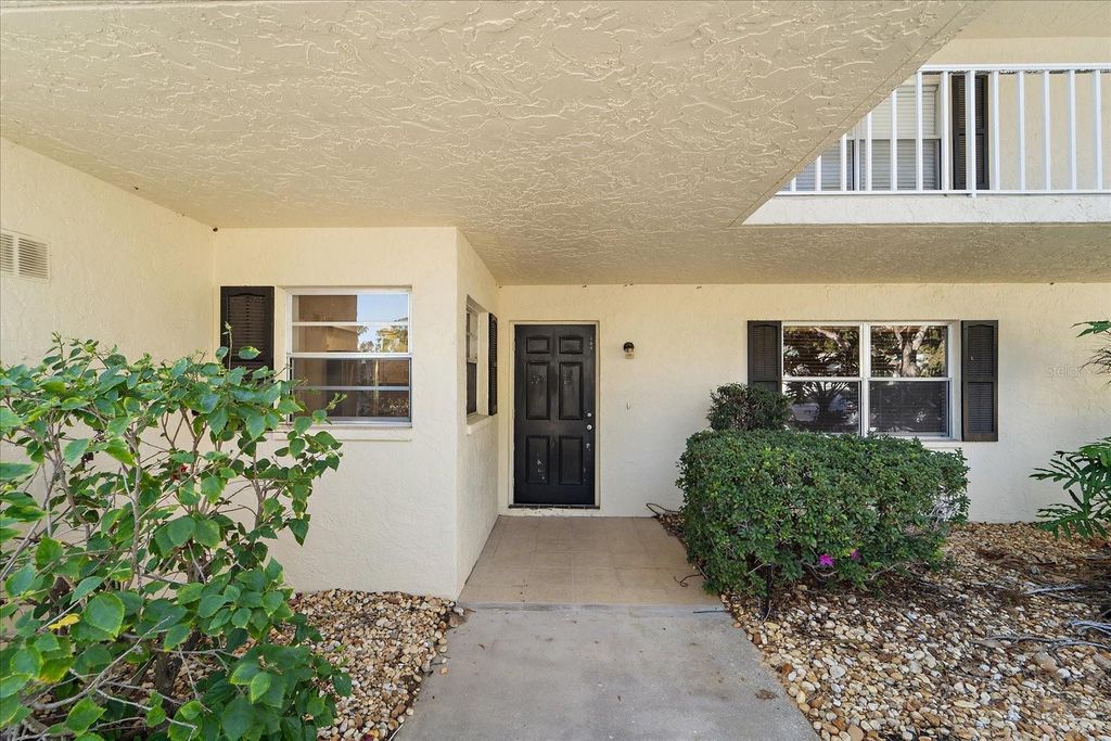 Photo of 7860 Palm Aire Lane #104, Sarasota, FL 34243 (MLS # A4676737)