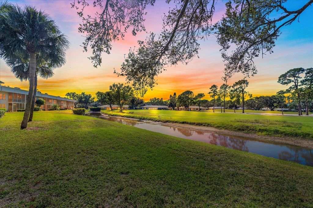 Photo of 7860 Palm Aire Lane #104, Sarasota, FL 34243 (MLS # A4676737)