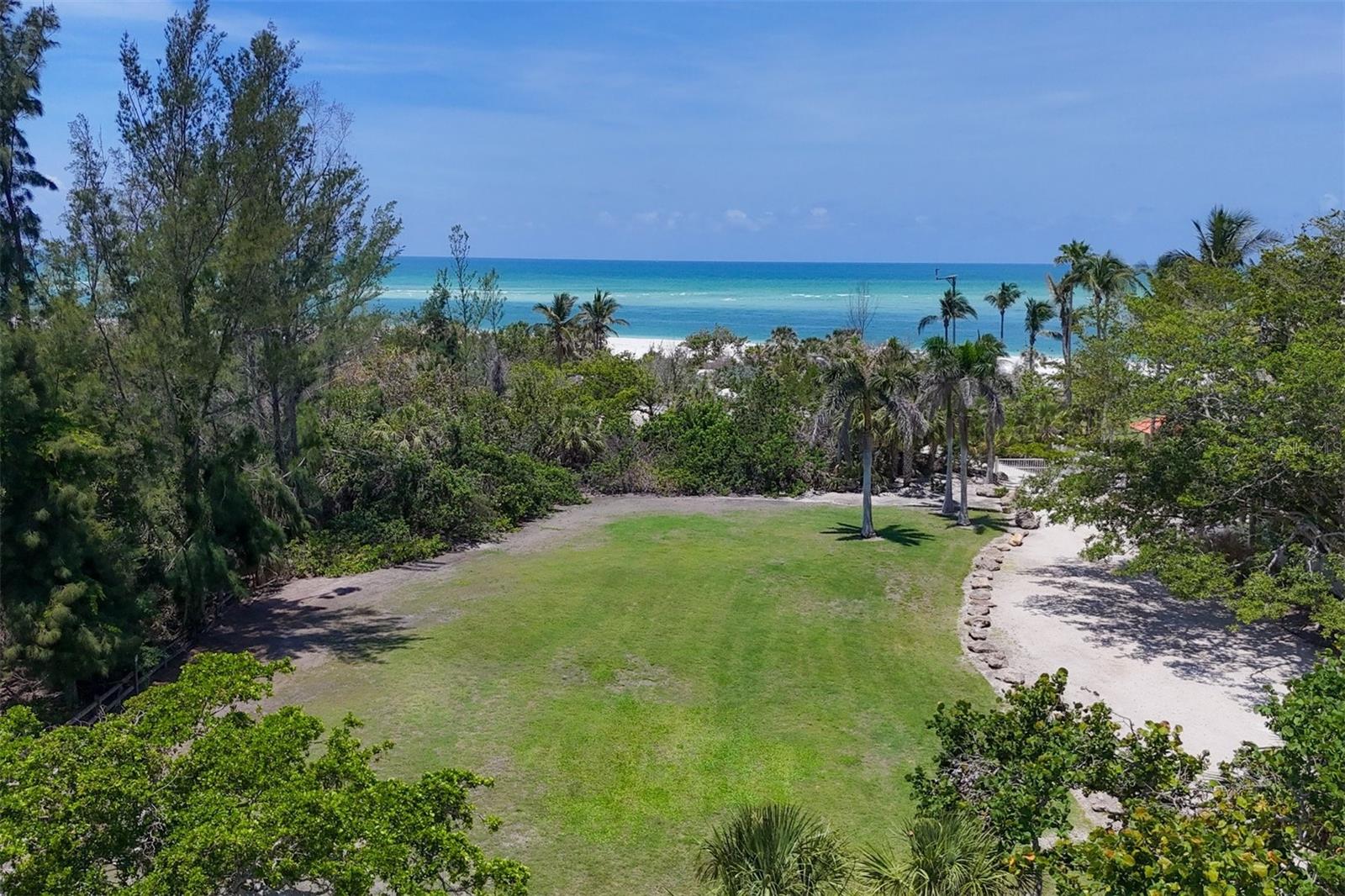 Situated along the iconic shores of Lido Key Beach, 1003 Westway Drive presents an unparalleled opportunity to craft a custom home with breathtaking panoramic Gulf of Mexico views and immediate access to Lido Key Beach. This 0.69-acre Gulf-facing lot offers an ideal setting for creating your bespoke beach house in one of Lido Key's most coveted communities. Located in the prestigious Lido Shores neighborhood, this parcel features amazing attributes including private beach access for Lido Shores residents, a short walk to the luxury boutiques and eateries of St. Armands Circle, and close proximity to the vibrant core of Downtown Sarasota. Endless Gulf of Mexico and sunset views, together with the potential for downtown Sarasota views and the privacy of a nature preserve on one side come together to create limitless potential. This is a chance to define your ultra-luxury lifestyle on Florida’s Gulf Coast. Adjacent parcel is also available creating unique compound or guest house options.