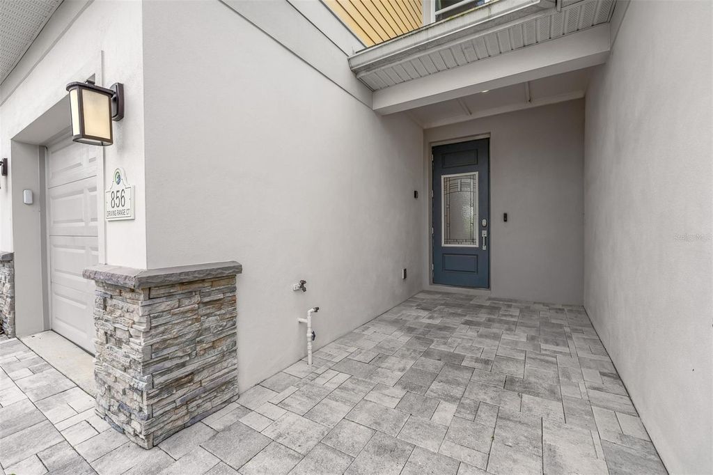 Photo of 856 Driving Range Court, Reunion, FL 34747 (MLS # O6402090)