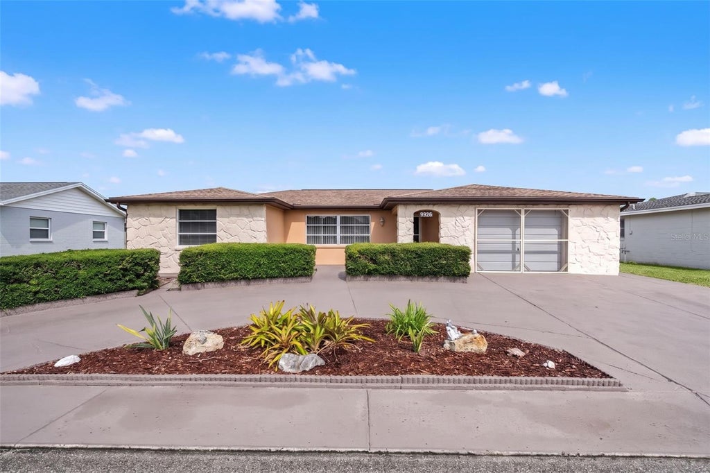 Photo of 9926 Lakeside Lane, Port Richey, FL 34668 (MLS # W7889048)