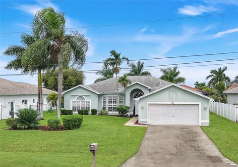 Photo of 305 SE 31st Street, Cape Coral, FL 33904 (MLS # C7532401)