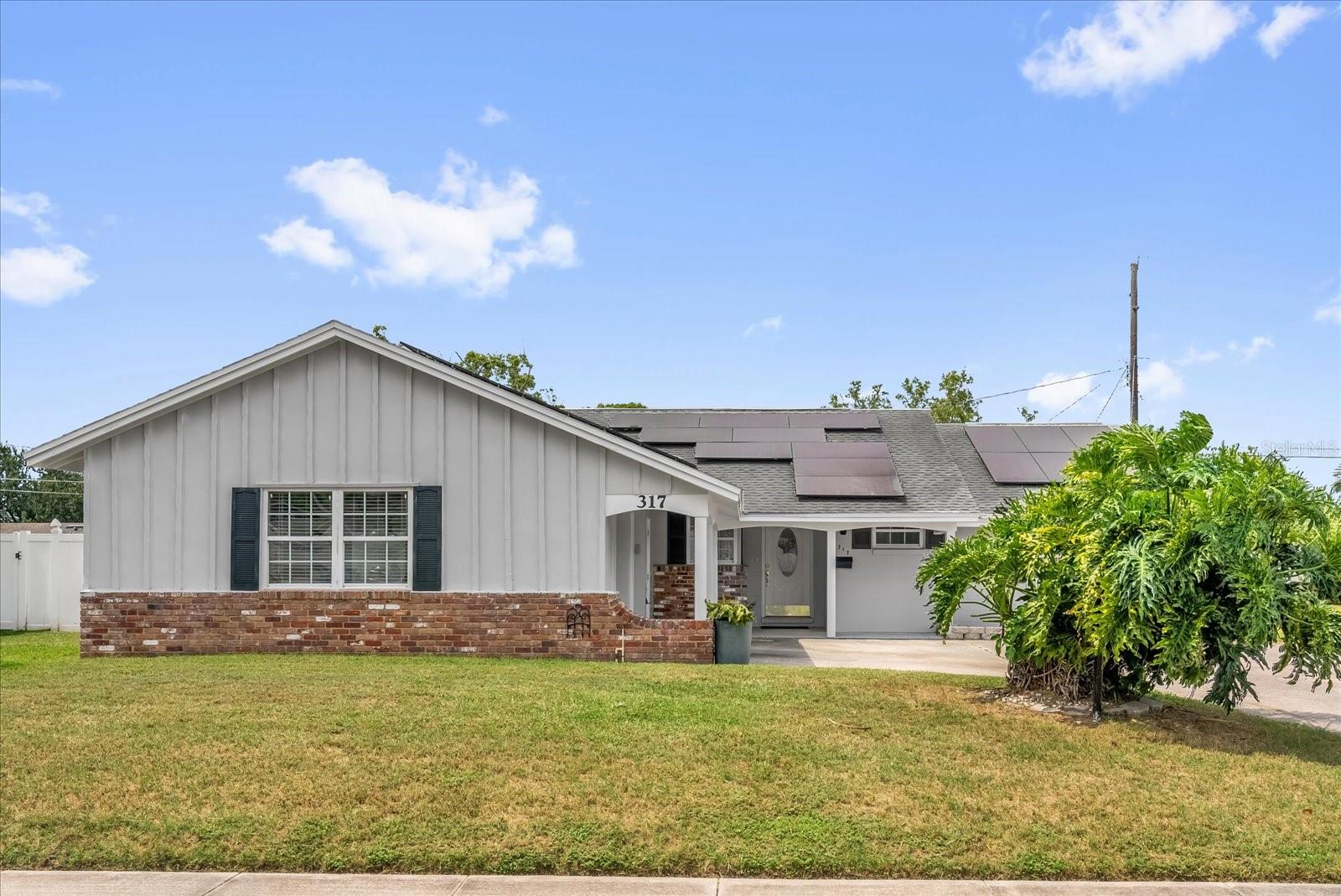 One or more photo(s) has been virtually staged. Welcome to this beautifully maintained 3-bedroom, 2-bathroom home offering the perfect blend of comfort, efficiency, and location. With major upgrades already completed—including a 2018 roof, brand new hot water heater (June 2025), and updated electrical panel (2016)—this home is truly move-in ready. Enjoy incredibly low energy bills thanks to the fully paid-off solar panels, and relax in your own private oasis featuring a sparkling pool, screened-in patio, and a vinyl privacy fence surrounding the backyard—ideal for both quiet mornings and lively gatherings. Inside, you’ll find fresh interior and exterior paint, along with stylish new vinyl wood-look tile flooring that adds warmth and character throughout the home. Centrally located just 15 minutes from Downtown Orlando and minutes from local restaurants and shopping, this home offers the convenience of city access with the comfort of a quiet neighborhood. Don't miss the opportunity to make this energy-efficient, thoughtfully updated home your own!