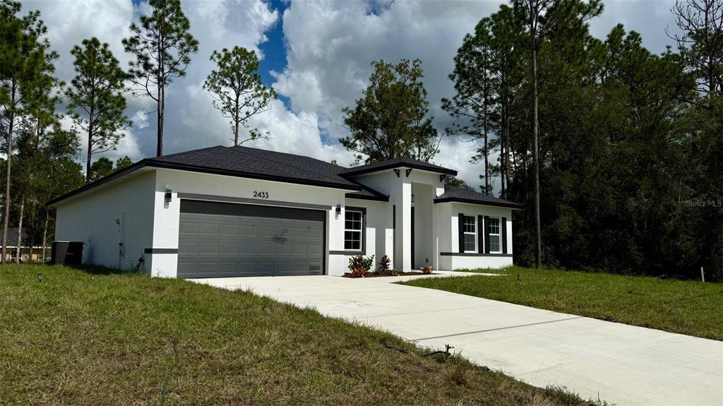 Photo of 2433 W Andromedae Drive, Citrus Springs, FL 34433 (MLS # O6351499)