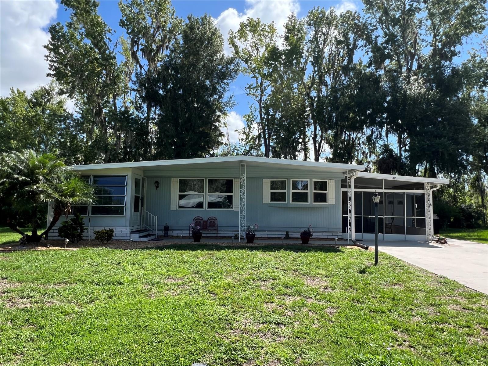 Welcome to this absolutely stunning, fully enhanced 2-bedroom, 2-bath home located in the highly desirable Continental Country Club — a gated, 55+ golf course community just minutes from The Villages. This home offers an exceptional combination of comfort, style, and functionality, and has been completely rebuilt from the studs with attention to detail in every corner. No detail was overlooked in this extensive renovation. From brand new drywall, baseboards, and stylish flooring to updated windows, roof, and electrical — everything has been upgraded. The home is freshly painted throughout with a tasteful color palette and features modern light and plumbing fixtures, giving it a clean, contemporary feel that’s move-in ready.
Step into the kitchen and you’ll immediately notice the custom soft-close cabinetry, quality countertops, and a charming breakfast nook with windows offering panoramic views of the beautifully maintained golf course. It’s the perfect spot to enjoy your morning coffee while watching golfers tee off. Just off the kitchen is a formal dining area for entertaining guests, which flows effortlessly into the huge living room — a wonderful space for relaxing or hosting gatherings.
But that’s not all — this home also boasts a spacious Florida room, a large screened-in lanai, and an additional smaller screened room, giving you multiple options to enjoy Florida’s beautiful weather year-round. The laundry area is located in a separate shed, which also includes a golf cart garage, workshop space, and extra storage. A double driveway with freshly poured additional concrete provides plenty of room for parking and includes a golf cart path leading directly to the cart storage area, with a 2013 EZ Go electric red golf cart ready for you to explore the new community.
Situated on a peaceful corner lot, the private backyard has just been cleared of all debris, and the trees have been professionally trimmed, giving the property a clean, open feel with beautiful landscaping and plenty of room to enjoy the outdoors. This home reflects true pride of ownership and is finished with the personal, thoughtful touches of its current owners.
To top it all off, this property includes the Resident Owner Certificate and a Golf Charter Membership, making it not just a home, but an entry into an active, welcoming lifestyle. Enjoy all that Continental Country Club has to give you— from golf and a heated pool to tennis, pickleball, shuffleboard, a dog park, and a full calendar of social events and activities.
Homes like this don’t come around often — especially with this level of upgrades and a golf course view. Call your agent today and come see the incredible value and charm this home has for you. This could be the perfect next chapter in your Florida lifestyle! (List of updates available)
