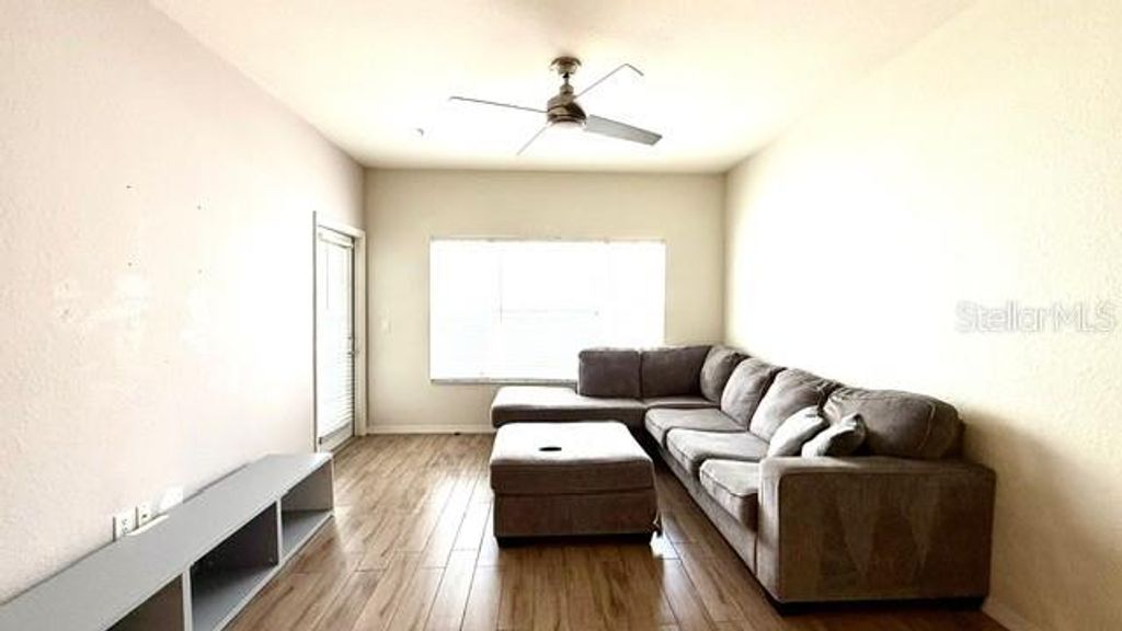 Photo of 2604 Grand Central Parkway #10, Orlando, FL 32839 (MLS # O6411172)