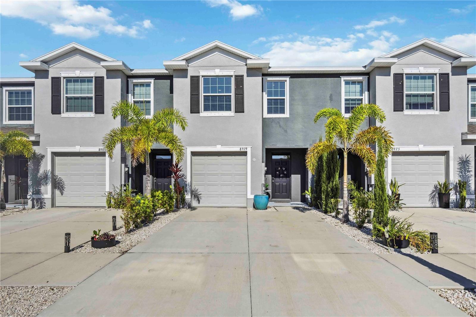Welcome to 8979 Milestone Drive – where style, comfort, and location come together in the heart of Sarasota.
This beautifully maintained 3-bedroom, 2.5-bath townhome is perfectly situated right across from the community pool—just a quick stroll to sun-soaked afternoons and relaxing dips. Out back, the screened-in lanai offers peaceful lake views and a front-row seat to Florida’s natural wildlife. Beyond the lake, you’ll find direct access to the Legacy Trail, one of Sarasota’s favorite spots for biking, jogging, and morning walks.
Step inside to a bright, open layout with thoughtful design touches throughout. The kitchen is the heart of the home, featuring upgraded granite countertops, stainless steel appliances, a large island, and plenty of storage—perfect for casual dinners or hosting friends. Upstairs, the spacious primary suite features two walk-in closets and a sleek, well-appointed ensuite bathroom. Two additional bedrooms, a full bath, and a convenient upstairs laundry room complete the layout.
Located in the sought-after Promenade East at Palmer Ranch, this low-maintenance townhome offers easy living close to shopping, dining, and top-rated schools. Scenic views. Smart design. Prime location.
This one checks all the boxes—schedule your private showing today.