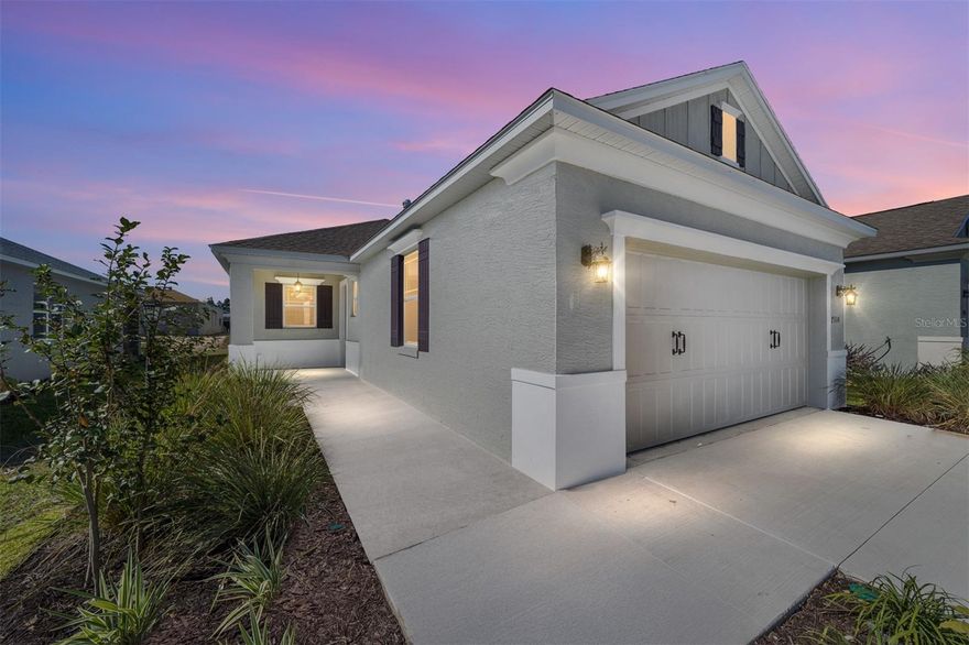 Beautifully designed Terra model located in the sought-after Weybourne Landing neighborhood of On Top of the World. This 2-bedroom, 2-bath home features a bright, open floorplan highlighted by laminate flooring and modern finishes throughout. The kitchen serves as the heart of the home, offering stainless steel appliances, staggered cabinets with crown molding, a stylish backsplash, quartz countertops, and a center island perfect for meal prep and casual dining. The adjacent living and dining areas create an inviting space for everyday comfort and entertaining. A versatile flex room with French doors and a closet adds valuable additional living space—ideal for a home office, hobby room, or guest overflow. The spacious primary suite includes a walk-in closet and a beautifully upgraded en suite with double sinks, quartz countertops, tile flooring, and a tiled walk-in shower featuring a glass door and built-in bench. Enjoy Florida’s outdoor lifestyle on the screened lanai, providing a peaceful retreat for morning coffee or evening relaxation. Located in a premier 55+ community, this home offers access to resort-style amenities including a clubhouse, fitness center, pool, dog park, and more—combining comfort, style, and an active lifestyle.