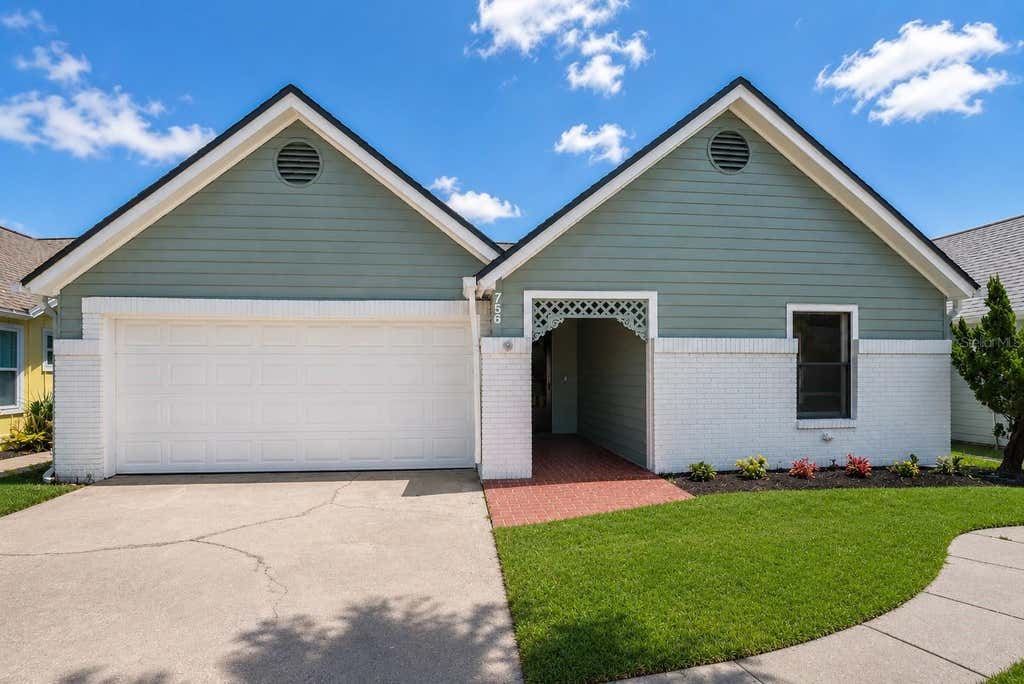 Photo of 756 Pine Shores Circle, New Smyrna Beach, FL 32168 (MLS # O6424752)