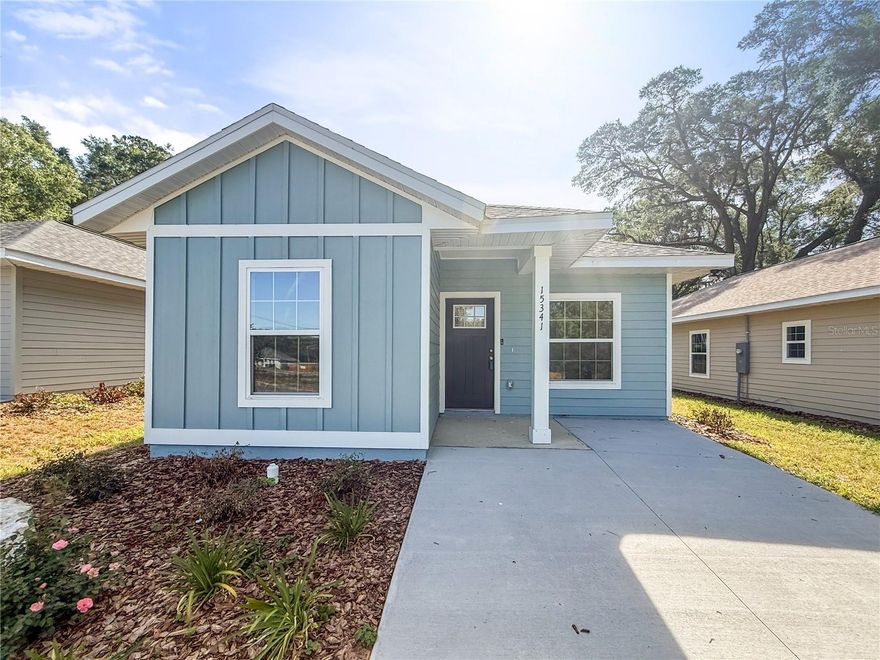 3-bedroom, 2-bath new construction home in Alachua, FL featuring a light and airy interior design. Offering approximately 1,243 heated square feet, this home provides an open living space with a clean, modern finish throughout.

The kitchen and bathrooms include quartz countertops and wood cabinetry, complemented by luxury vinyl plank flooring throughout the home. The layout places two bedrooms and a shared bathroom toward the front, with the primary bedroom located toward the back for added privacy. The primary bathroom features a walk-in shower.

Additional features include updated fixtures, a covered front entry, and a Ring doorbell. Convenient location with quick access to I-75 and nearby Gainesville.