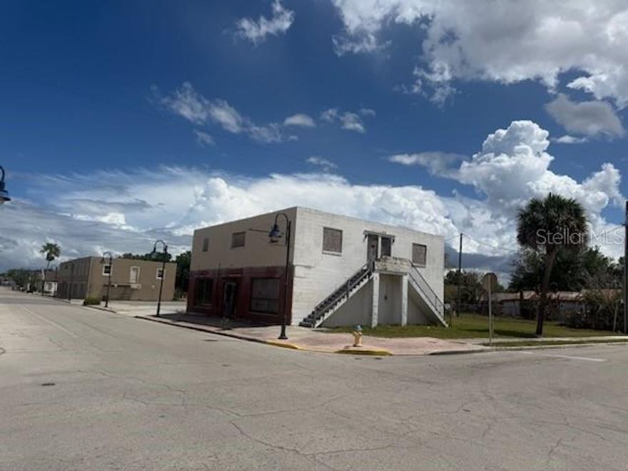 Rare mixed-use investment opportunity in the heart of Lake Wales, FL! Full renovation needed on this iconic two-story building, formerly home to the beloved Parker Grocery, sits on Lincoln Ave and is ready to be reimagined from the ground up. With a wide-open ground floor spanning the full footprint of a historic general store, plus a dedicated storage area and bathroom, the possibilities for retail, restaurant, boutique, office, or creative commercial space are virtually limitless.

The second floor features two spacious 2-bedroom, 2-bathroom apartments at 900 sq ft each, offering immediate residential income potential once renovated. Whether you envision a live-work building, a ground-floor business with tenants above, or a fully residential conversion, this property is a blank canvas waiting for the right investor's touch.  

Lake Wales is a growing community with deep roots and an exciting future,  and properties like this don't come along often. Bring your contractor and your imagination. The bones are there. The location is there. All it needs is your vision.