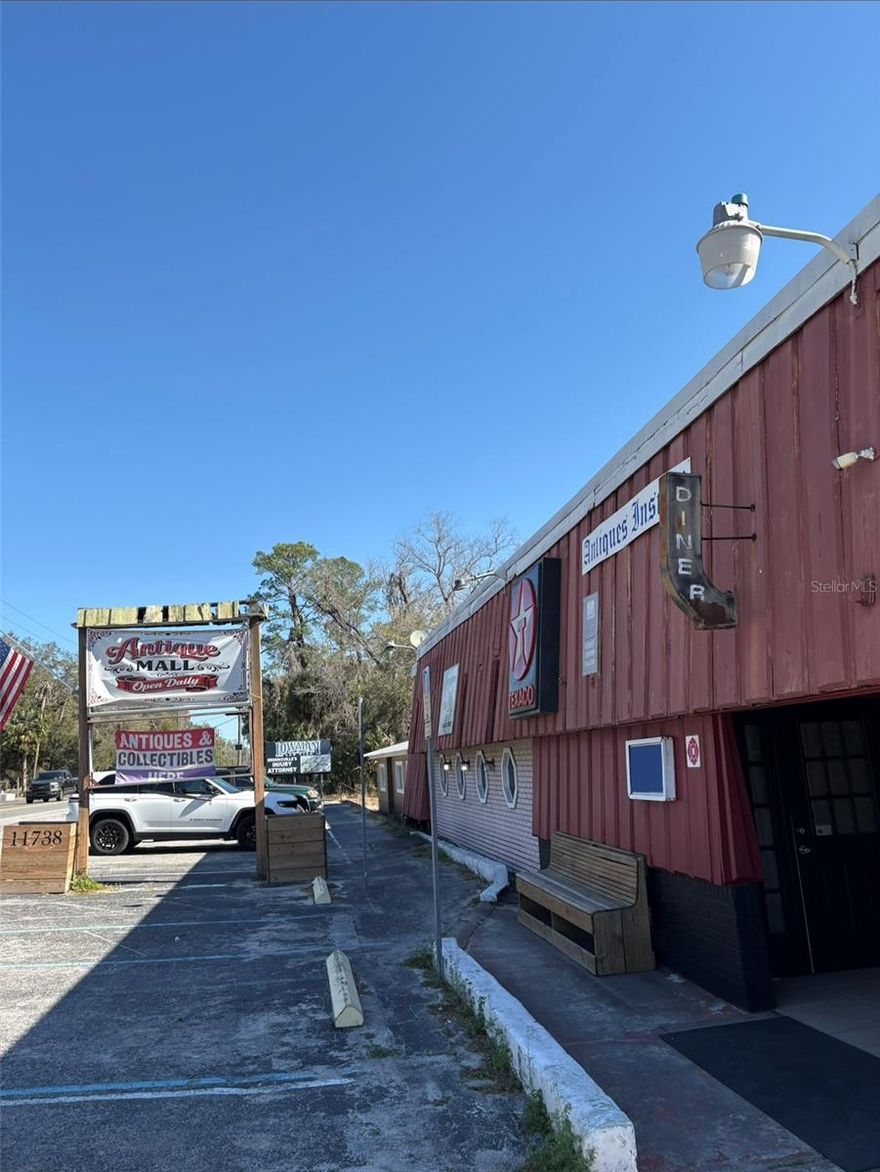 Discover a rare opportunity to own a truly versatile property on the edge of Brooksville. Currently operating as a well-established antique mall. The property features a spacious, adaptable layout that lends itself to countless possibilities: retail storefront, restaurant or café (with restaurant equipment included), office space, creative studio, showroom, private apartment, or a one-of-a-kind mixed-use concept. Whether you’re an investor, entrepreneur, or owner-occupant, this property provides a solid foundation for growth. Located on Broad Street / Highway 41 with strong visibility and accessibility, the building’s character, functionality, and location make it a standout investment. Opportunities like this don’t come around often.