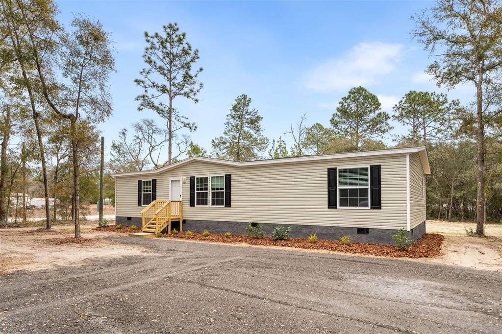 Photo of 7591 NE 90th Avenue, Bronson, FL 32621 (MLS # GC537403)