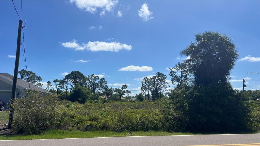 Photo of 74 Macarthur Drive, Port Charlotte, FL 33954 (MLS # C7524645)
