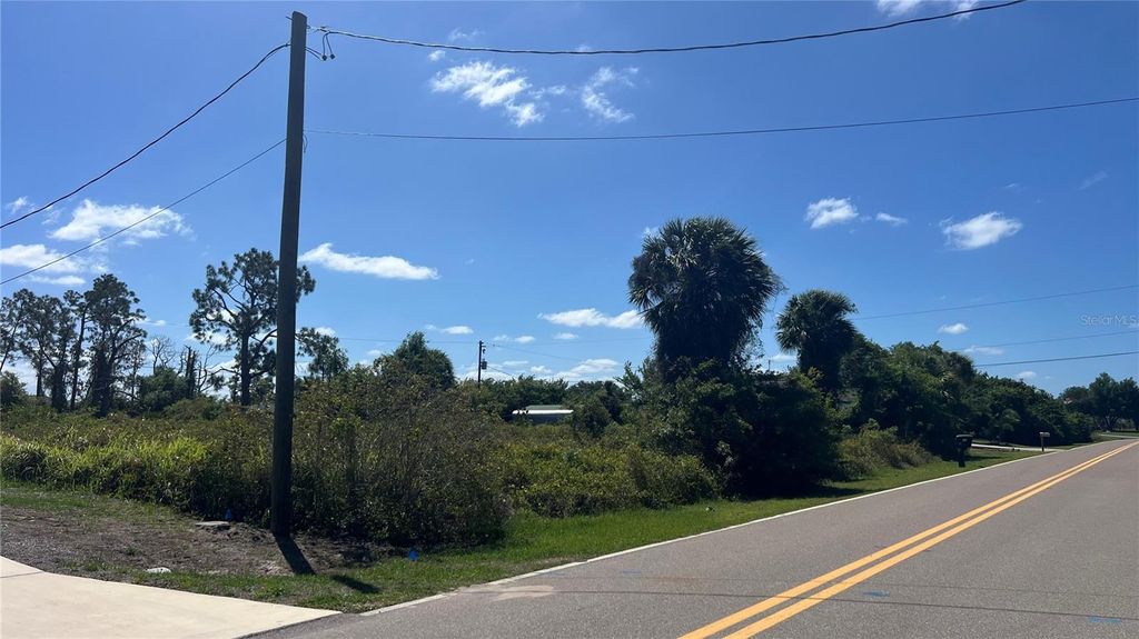 Photo of 74 Macarthur Drive, Port Charlotte, FL 33954 (MLS # C7524645)