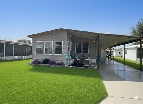 Photo of 34344 Timberland Boulevard, Wesley Chapel, FL 33543 (MLS # TB8355187)