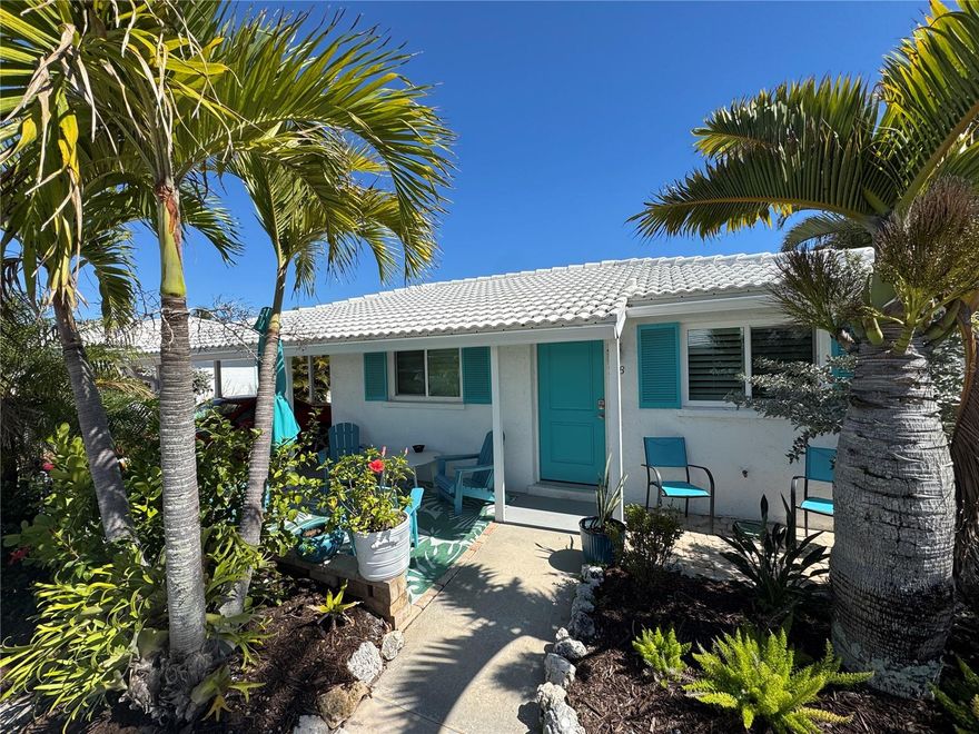 Discover Longboat Key waterfront living at its very best at 718 Spanish Dr N, a beautifully updated freestanding villa in the sought-after Spanish Main Yacht Club. This home has been completely renovated to today’s highest standards following Hurricane Ian, delivering a fresh, high-end coastal finish throughout with meticulous craftsmanship and premium materials. Just steps from your door, enjoy private deeded beach access to the powder sands and turquoise color of the Gulf of Mexico — perfect for sunrise walks, beachcombing, or sunset gatherings. Boaters will appreciate the community’s deep-water marina with boat slips priced around $1,200 annually that have direct access to the Intracoastal Waterway, and quick passage to the open Gulf, along with kayak racks and fishing right at hand. Inside, the bright open-concept 2-bedroom, 2-bath villa showcases an elevated, contemporary coastal design. The gourmet kitchen is a true entertainer’s dream, featuring sleek modern cabinetry, elegant stone countertops, a spacious island, and high-end stainless steel appliances. Sunlight pours through the generous windows and sliders, highlighting the beautiful new flooring that flows seamlessly into the living and dining areas. A sun-drenched Florida room/lanai offers flexible space, ideal for a home office, artist studio, or casual living — all overlooking lush tropical landscaping and a peaceful community setting. Both bedrooms are generously sized with ample closet space, while the updated baths feature contemporary fixtures and finishes for a spa-like feel. Additional highlights include a private outdoor shower, a spacious carport for your island toys, and thoughtful storage throughout. This vibrant, friendly 55+ community (can be under 55 to purchase) offers a heated pool, a clubhouse with marina views, shuffleboard courts, and a welcoming social atmosphere. Maintenance-free living, beautifully landscaped grounds, and covered parking complete the carefree Longboat Key lifestyle. Whether you seek a full-time waterfront residence, seasonal escape, or outstanding investment, 718 Spanish Dr N offers turnkey luxury with effortless deeded beach access and marina convenience in one of Longboat Key’s most desirable waterfront enclaves. Minutes to St. Armand's Circle, downtown Sarasota, and Anna Maria Island, yet tucked away in paradise. Don’t miss this rare opportunity to own a freshly renovated gem in Spanish Main Yacht Club — where high-end coastal living meets the best of island boating and beach life!
