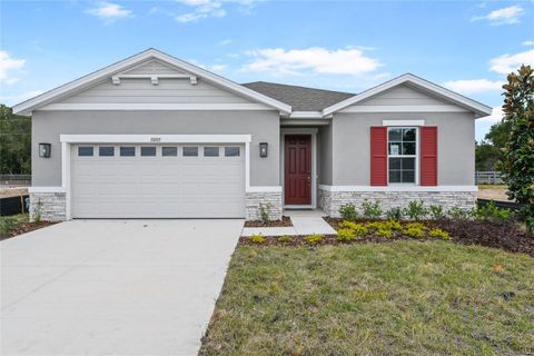 Photo of 10105 Turnberry Lane, Leesburg, FL 34788 (MLS # S5140262)