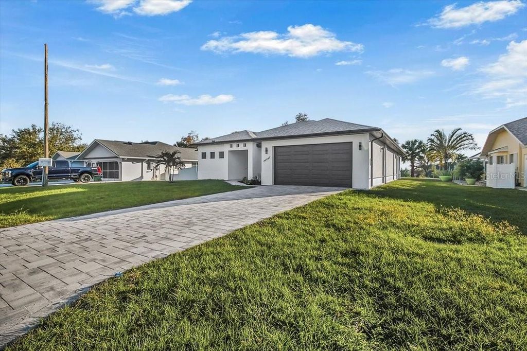 Photo of 26447 Europa Lane, Punta Gorda, FL 33983 (MLS # OM720294)