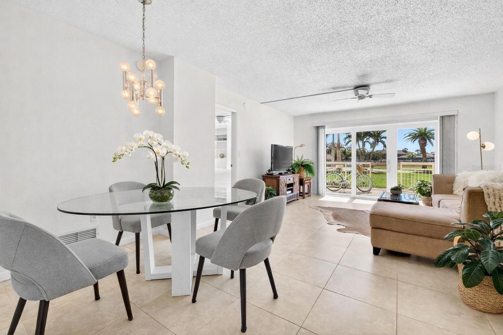 Photo of 4900 Brittany Drive S #112, St Petersburg, FL 33715 (MLS # TB8468850)