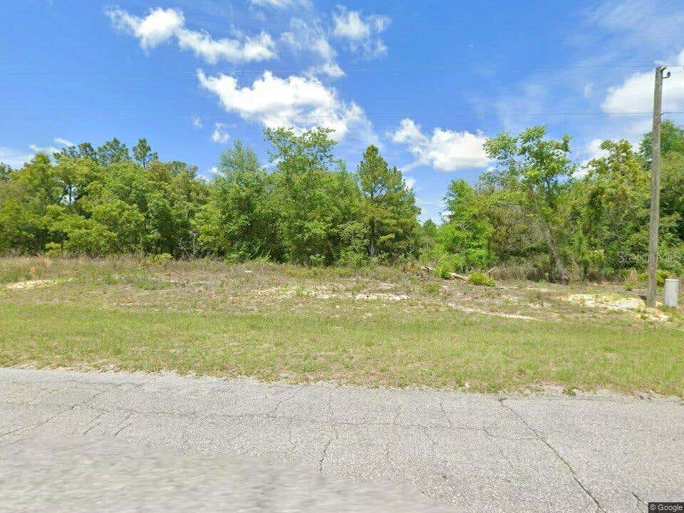 Photo of 6603 N Bedstrow Boulevard, Citrus Springs, FL 34434 (MLS # OM729893)