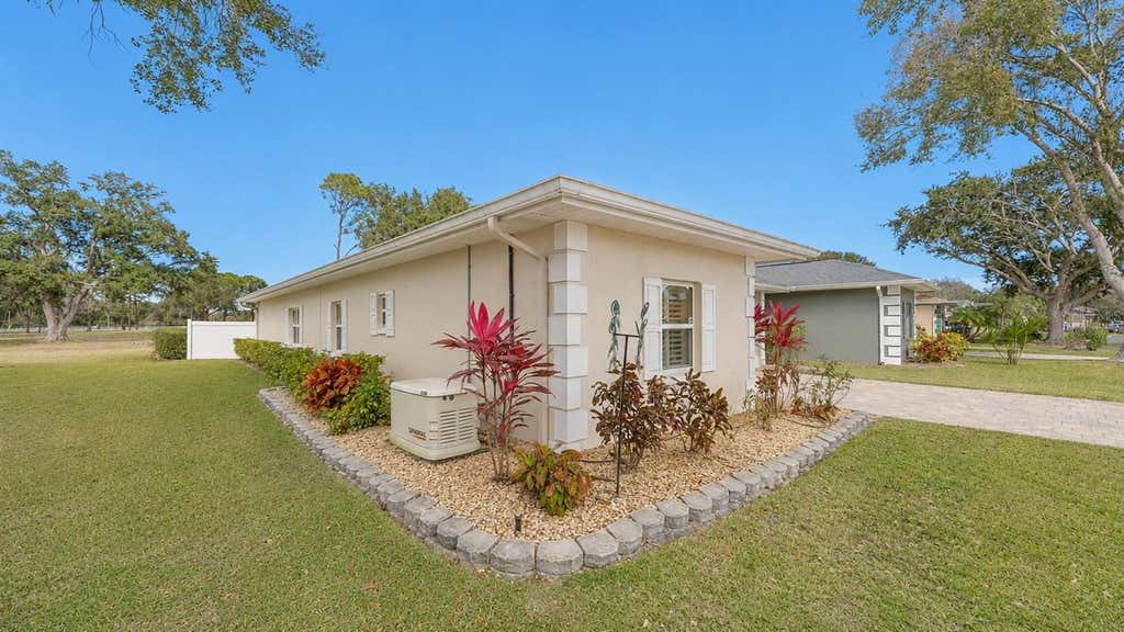 Photo of 728 Canberra Road, Winter Haven, FL 33884 (MLS # P4939181)