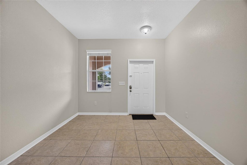 Photo of 10709 Savannah Landing Circle, Orlando, FL 32832 (MLS # O6437798)
