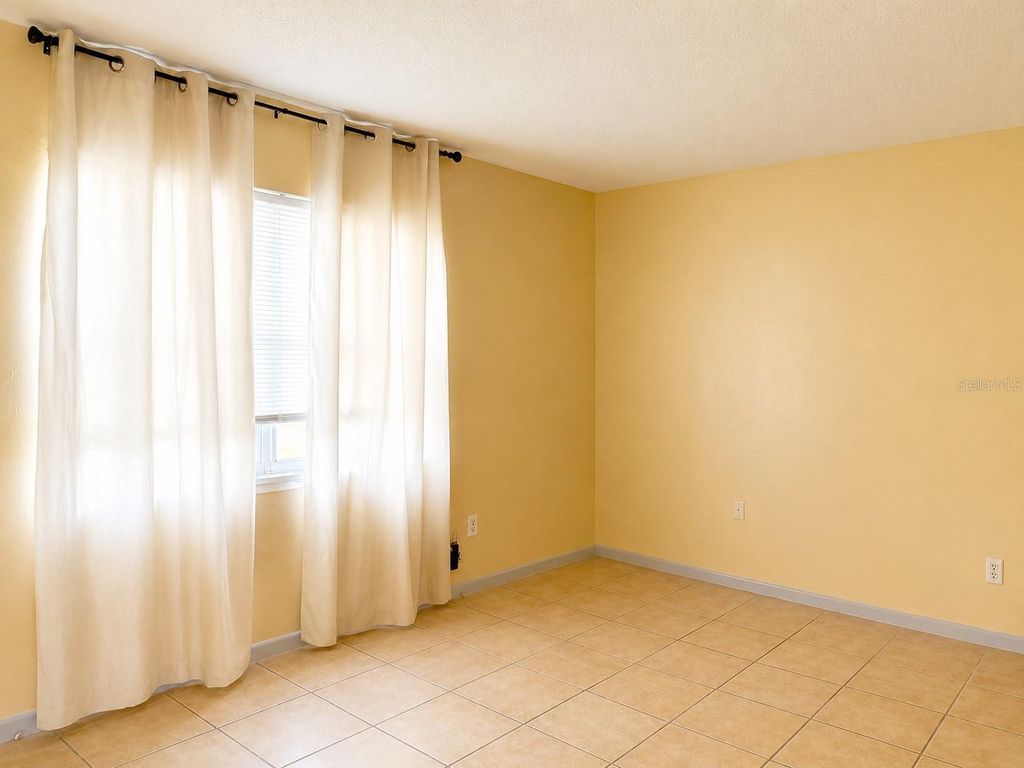 Photo of 5885 Dahlia Drive #106/9, Orlando, FL 32807 (MLS # O6406175)