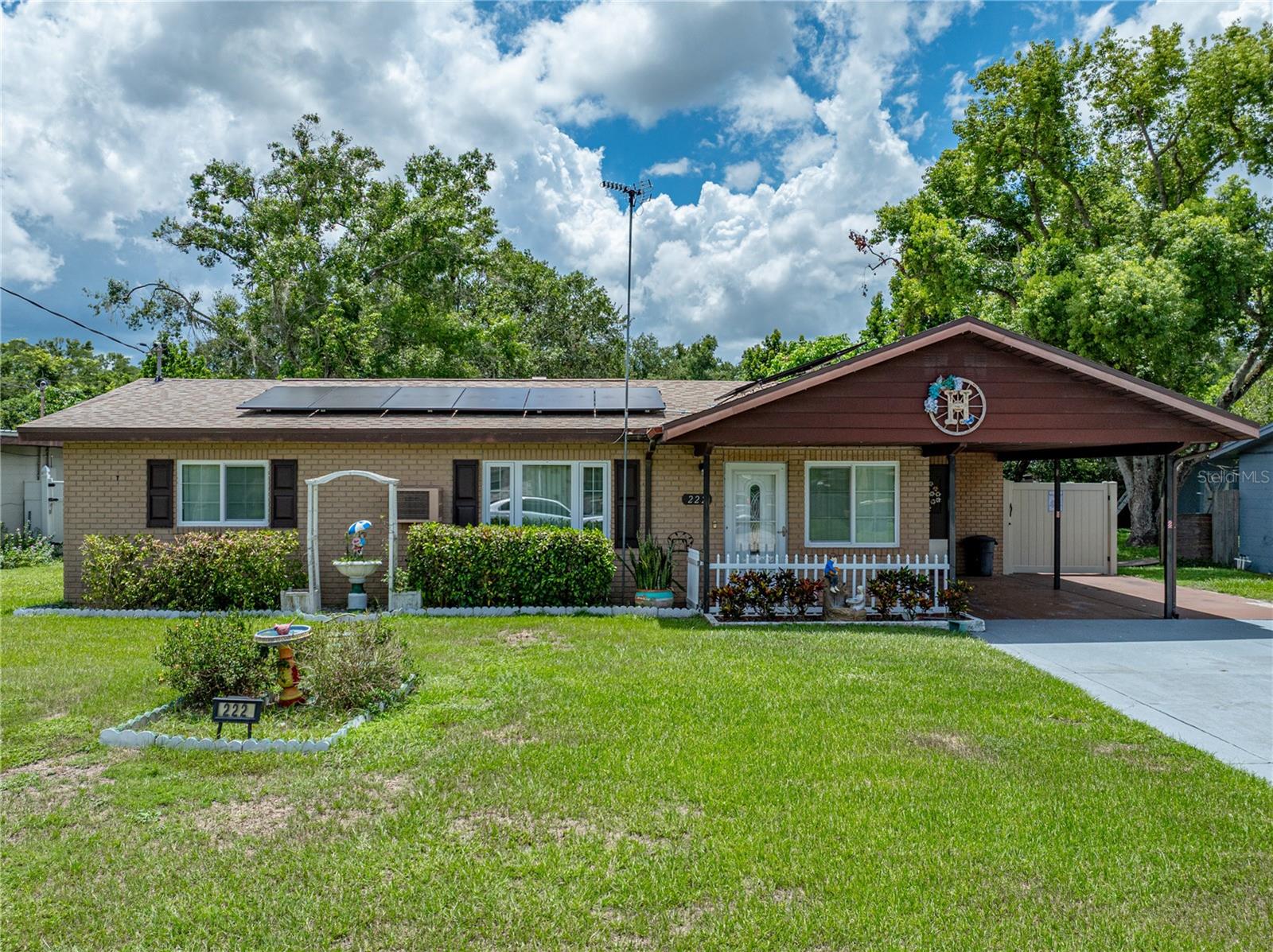 LOTS OF CURB APPEAL - NO HOA - A 10 X 20 WORKSHOP - ELECTRIC BILLS UNDER $75.00 PER MONTH - This home has lots to offer. The back yard is totally fenced with two large gates on either side. This three bedroom one bath has new double pane windows that were installed in 2024. The cozy eat-in kitchen has warm colored wood cabinets. All appliances including the washer and dryer will remain with the home. There are two bonus rooms--one located at the front of the home and one at the rear that overlooks the back yard. The roof and hot water heater were installed in 2019, the oven was purchased in 2024 and a new drain field was added in 2017. The huge workshop in the back yard has electric and an automatic fan for ventilation. There is also a wooden gazebo perfect for grilling and entertaining your guests. There is also a screened porch at the rear of the home that is nicely sized. This home is priced to sell !! This property is conveniently located to shopping, I-4 (for easy access to Tampa and Orlando) and just minutes to Legoland. This home is close to Disney World and all that Central Florida has to offer. Make your appointment today to view.