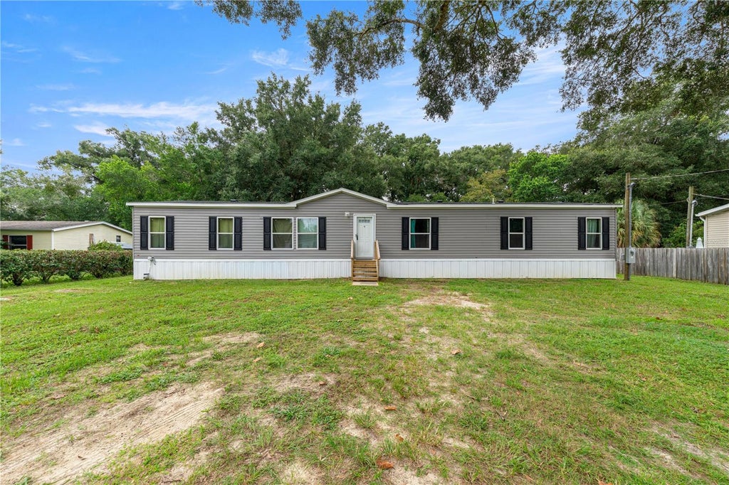 Photo of 10838 SE 129th Lane, Belleview, FL 34420 (MLS # OM732877)