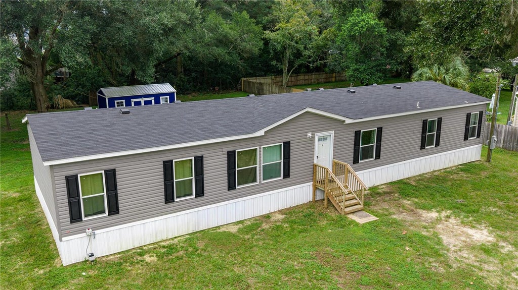 Photo of 10838 SE 129th Lane, Belleview, FL 34420 (MLS # OM732877)