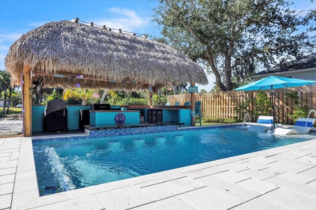 Photo of 9470 Colony Drive, North Fort Myers, FL 33917 (MLS # A4670644)