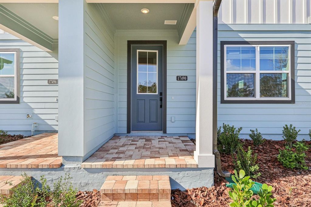 Photo of 17490 Northlake Grove Drive, Winter Garden, FL 34787 (MLS # TB8460402)