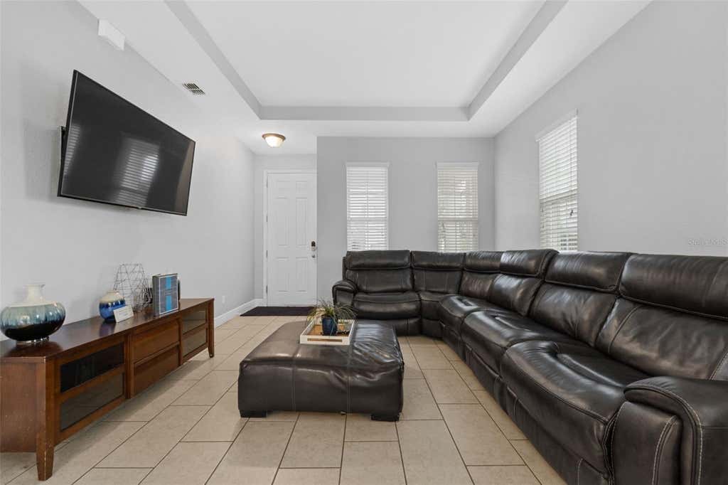 Photo of 206 Aberdeen St, Davenport, FL 33896 (MLS # O6415203)