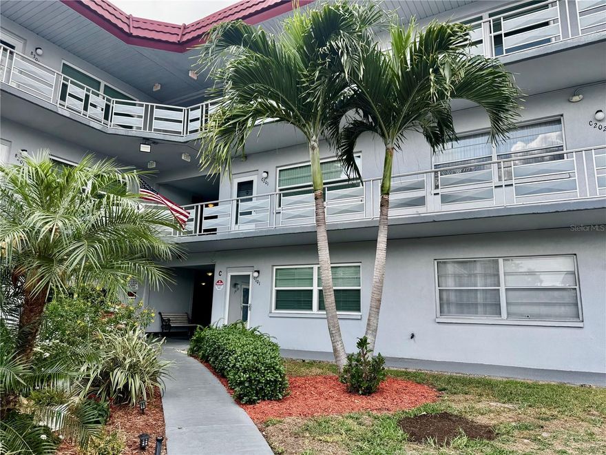 Welcome to Five Towns! This charming 1-bedroom, 1-bath ground-floor condo in the sought-after 55+ community offers easy Florida living with an updated kitchen, open floor plan, plantation shutters, laminate and tile flooring, walk-in closet, and walk-in shower. Relax just outside your back door in the peaceful landscaped setting. Condo fees include cable, internet, gas, water, sewer, and exterior maintenance. Covered carport parking too!  Enjoy resort-style amenities including 6 pools, 2 clubhouses, fitness centers, and endless social activities. Conveniently located near shopping, dining, medical facilities, downtown St. Petersburg, and the Gulf beaches. Vacant, motivated seller and move-in ready!