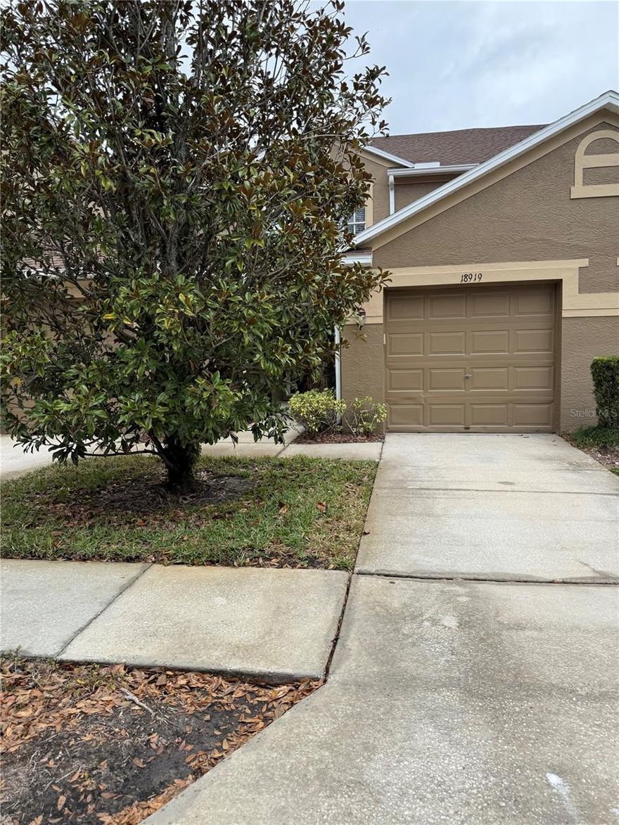 WELCOME HOME to this beautifully updated 2-bedroom, 1.5-bath, 1-car garage townhome located in the stunning gated community of Promenade in the West Meadows area of New Tampa. Live the New Tampa lifestyle in this updated, move-in ready townhome with tranquil water and conservation views glass sliders create an effortless connection to the outdoors, perfect for morning coffee or evening relaxation
new Laminate flooring, remodeled baths, and soaring ceilings that make the home feel bright and spacious. Upstairs, a split-bedroom layout offers privacy, and the oversized primary suite includes a walk-in closet and renovated bath. Promenade offers low-maintenance living with its own community pool,Residents of West Meadows enjoy a resort-style recreational complex complete with swimming pools (one with a slide!), lap pool, splash pad, fitness center, tennis and basketball courts, and a playground—making it ideal for families and outdoor enthusiasts.