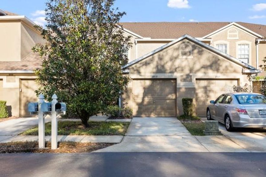 WELCOME HOME to this beautifully updated 2-bedroom, 1.5-bath, 1-car garage townhome located in the stunning gated community of Promenade in the West Meadows area of New Tampa. Live the New Tampa lifestyle in this updated, move-in ready townhome with tranquil water and conservation views glass sliders create an effortless connection to the outdoors, perfect for morning coffee or evening relaxation
new Laminate flooring, remodeled baths, and soaring ceilings that make the home feel bright and spacious. Upstairs, a split-bedroom layout offers privacy, and the oversized primary suite includes a walk-in closet and renovated bath. Promenade offers low-maintenance living with its own community pool,Residents of West Meadows enjoy a resort-style recreational complex complete with swimming pools (one with a slide!), lap pool, splash pad, fitness center, tennis and basketball courts, and a playground—making it ideal for families and outdoor enthusiasts.