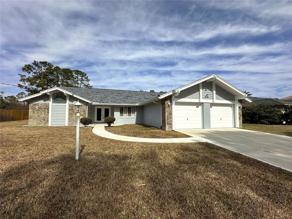 Photo of 100 Webster Lane, Palm Coast, FL 32164 (MLS # FC315876)