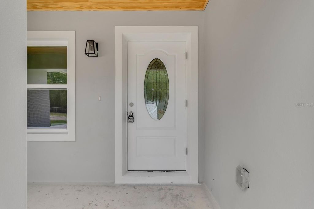 Photo of 413 Poppy Lane, Inverness, FL 34452 (MLS # O6403603)