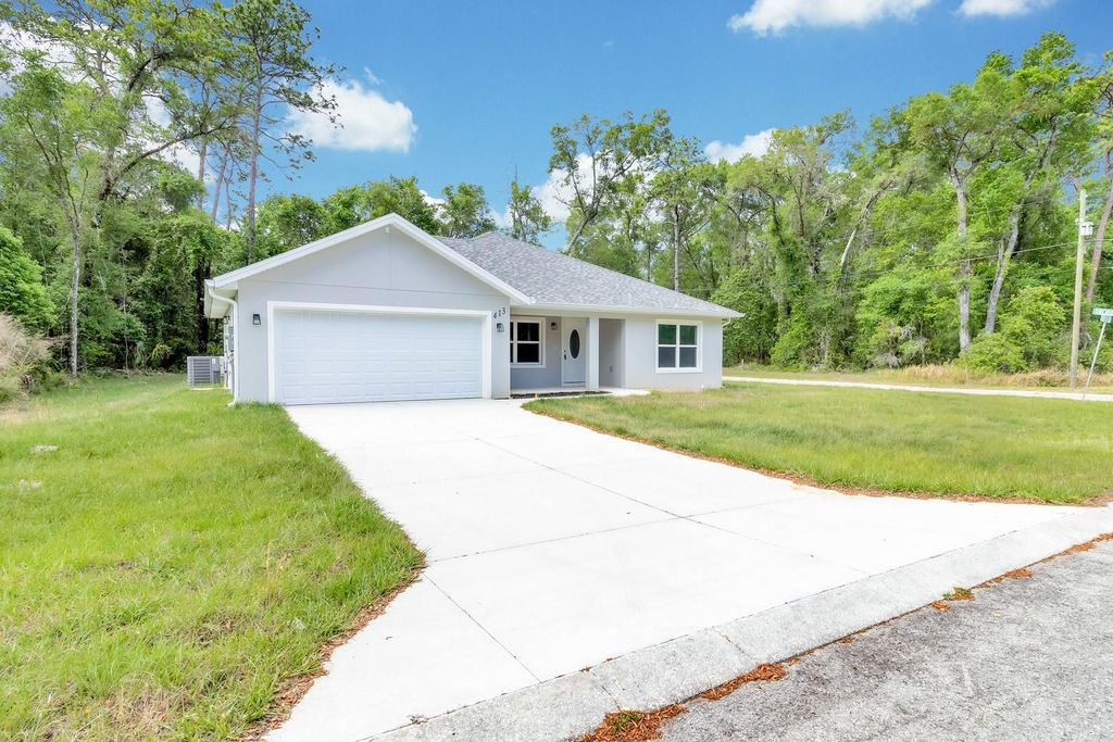 Photo of 413 Poppy Lane, Inverness, FL 34452 (MLS # O6403603)