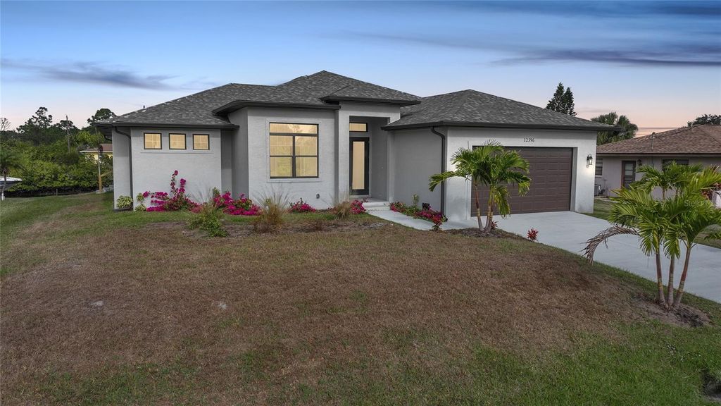 Photo of 12396 Bacchus Road, Port Charlotte, FL 33981 (MLS # C7519115)