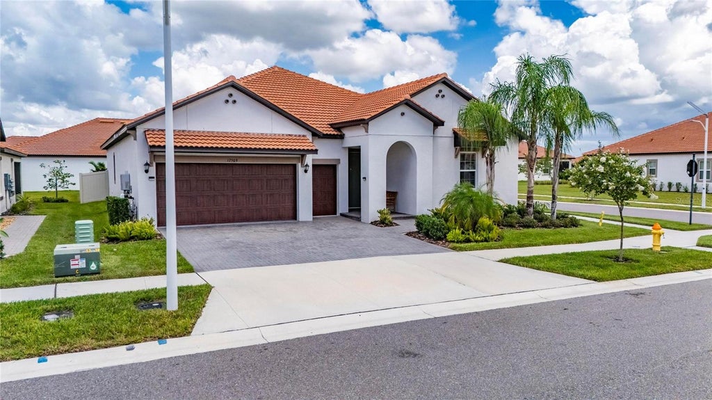 Photo of 17509 Holly Well Avenue, Wimauma, FL 33598 (MLS # TB8540583)