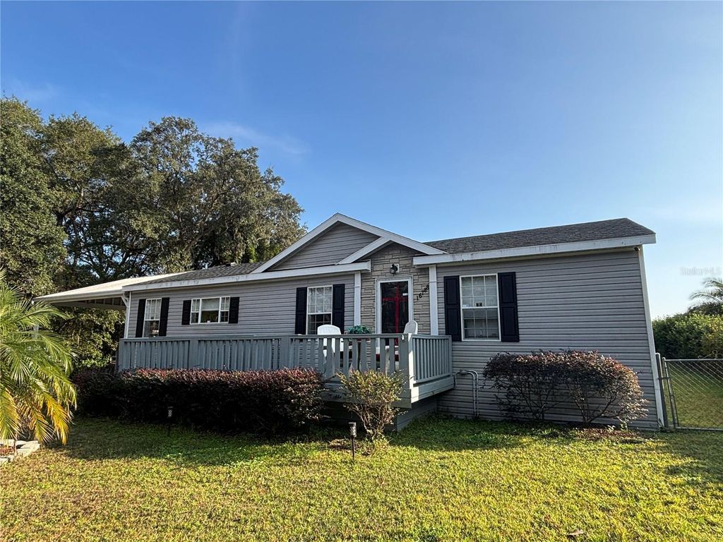 Photo of 16788 SE 69th Lane, Ocklawaha, FL 32179 (MLS # OM714625)