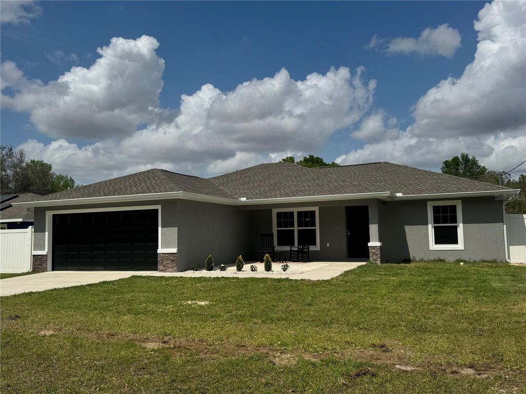 Photo of 13373 SW 111th Lane, Dunnellon, FL 34432 (MLS # O6395442)