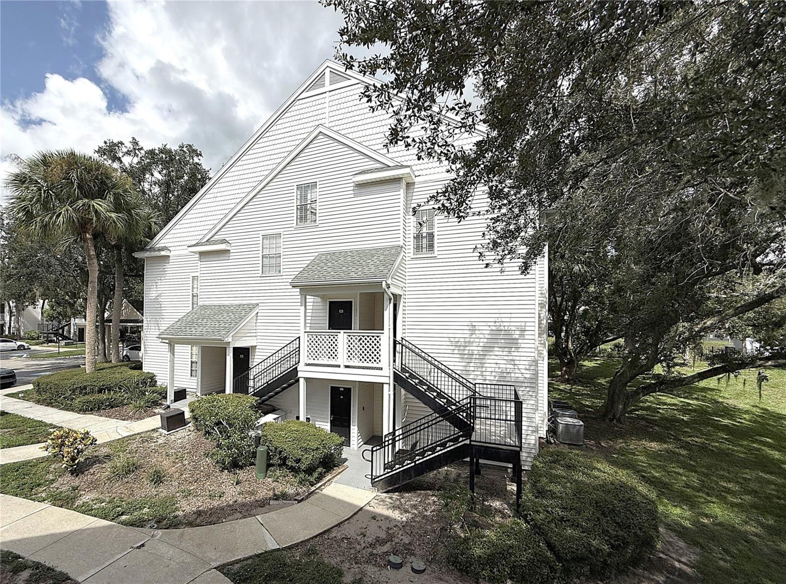 Now available 2/2 Split plan with BONUS LOFT in the Gated Community of The Bentley at Cobb's Landing, across from Carwise Middle school. This condo is a 2nd and 3rd floor home, with all the upgrades, including BRAND NEW washer and dryer! The kitchen has granite counters and stainless appliances, and the open floorplan is flooded with natural light and features a 2-story open vaulted ceiling, with a unique dual ceiling fan and a working wood fireplace! Relax on the screened porch overlooking the community’s private pond. Both bedrooms have ceiling fans and walk-in closets, plus the 2nd bath opens to the hall and 2nd bedroom. The community features a resort-style pool and spa, and clubhouse with fitness center and entertainment areas. There’s an outdoor basketball court and car wash station for you to use. Rent includes water, sewer, trash and basic cable. Live close to shopping, the beaches, Pinellas Trail and top-rated schools. Come see to appreciate!!!