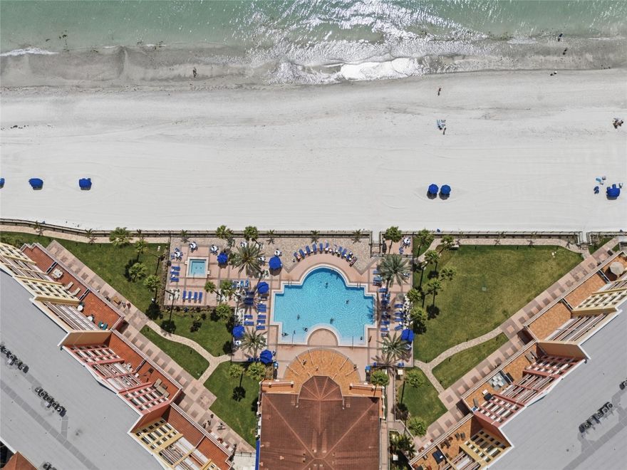 Located in one of the most desirable buildings within the gated, Gulf-front Tides Beach Club, this exceptional 3-bedroom, 2-bath residence in Building 4 offers sweeping, unobstructed views of the Gulf and breathtaking sunsets from its prime 3rd-floor position. With 1,460 square feet of living space, the open-concept layout is filled with natural light and seamlessly connects indoor and outdoor living.

A 28-foot private balcony—accessible from both the living room and primary suite—provides the perfect setting for morning coffee or evening entertaining. Interior features include a custom installed feature wall in the dining & great room, porcelain tile flooring, granite countertops, crown molding, stainless steel appliances, and a light, coastal design throughout. The kitchen flows effortlessly into the great room and dining area, all oriented toward stunning Gulf views.

The primary suite offers balcony access, a walk-in closet, and a spa-like bath with dual vanities and a walk-in shower. A split-bedroom plan ensures privacy, with two additional bedrooms featuring custom California closets. A custom Murphy bed is included, and all furnishings are negotiable for a move-in ready opportunity. Sellers will even include a kayak for blissful days on the Gulf.

Additional highlights include new HVAC (2025) & water heater (2025),  newer full-size LG washer/dryer, newer Samsung fridge, new toilets, impact-rated sliders & windows (2023), assigned under-building parking, and private storage. 

Residents enjoy resort-style amenities including three beachfront pools, heated spa, grills, Big Green Eggs, fitness center,  recently remodeled clubhouse with 2 kitchens for entertaining, and 24-hour gated security, all set along a pristine stretch of white sand beach. Ideally located near St. Petersburg, dining, shopping, and two international airports, with a 30-day minimum rental policy offering excellent investment potential.