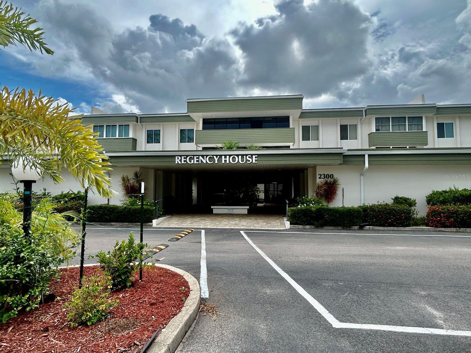 Imagine stepping into a charming condo nestled within a 55+ Regency house in the serene neighborhood of Port Charlotte. This condo boasts recent upgrades, including a replaced AC unit in 2023 and a sturdy roof. Upon entering, you'll find a cozy storage area, perfect for keeping belongings organized and easily accessible. The convenience of being on the same level as the laundry room and social room adds to the practicality of daily living. The condo complex itself offers amenities designed for relaxation and recreation, including two inviting pools for swimming and lounging, a tennis court and more for outdoor activities, and a spacious social room for gatherings and events. It has hurricane-proof sliding doors leading to a tranquil lanai area. This ensures both safety and comfort. Additionally, the condo includes assigned parking under a covered area. Surrounded by convenient shopping options and close to hospitals, this location ensures easy access to daily necessities and essential services. Whether you're seeking a tranquil retreat or a place to entertain and socialize, this Regency condo in Port Charlotte offers a blend of comfort, convenience, and community amenities that cater to various lifestyles.
