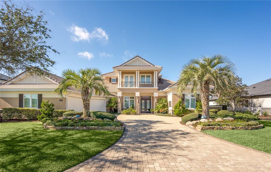 Exquisite Custom-Built Home located in the gated oceanfront community of Ocean Hammock’s Northshore Estates.
Nestled on a premier estate lot in the gated Ocean Hammock community, this luxurious residence, custom-designed and built by Machin Design Builders in 2010, offers unparalleled craftsmanship and stunning water views. Spanning 4,824 square feet of conditioned space and 6,463 square feet under roof, this 4-bedroom plus office, 4.5-bath home is the epitome of elegance and functionality.
Enjoy expansive views of the 14th fairway and green of the Par 5 Jack Nicklaus Hammock Beach Ocean Golf Course, from this meticulously landscaped property, which boasts 115 feet of water frontage on a 14,950-square-foot lot. Professional landscaping, outdoor lighting, and a recently redesigned sprinkler system ensure both beauty and ease of maintenance.
The home features soaring 12-foot ceilings on the main level, with 13-foot tray and coffered ceilings in the entryway, living room, dining room, den, sunroom, and master bedroom. Exquisite custom millwork enhances every room, adding timeless character.
The home is equipped with a state-of-the-art Crestron home automation system, controlling everything from lighting and music to climate control, security, and pool equipment, all at your fingertips. High-end custom cabinetry and premium quartzite and granite countertops elevate the kitchen, bathrooms, and living spaces. The gourmet kitchen is a chef’s dream, featuring Monogram appliances, including a 48-inch side-by-side refrigerator/freezer, double ovens, Viking 6-burner propane cooktop, two wine refrigerators, and a new Kitchenaid dishwasher. Additional highlights include propane gas fireplaces in both the living room and sunroom with stack stone surround, a bar area in the sunroom with built-in ice chests and a beverage refrigerator, and a central vacuum system for added convenience. Impact-resistant windows and doors provide peace of mind during hurricane season.
The oversized 3-car garage offers ample storage, including a climate-controlled storage area, cabinet storage system with workbench, and a new Shark floor coating. Outdoors, the expansive lanai with a beautiful pool and hot tub overlooks the serene lake and the 14th fairway, creating a perfect retreat for relaxation or entertaining. The convenient summer kitchen invites al fresco dining, allowing you to enjoy the outdoors in comfort. The large heated pool and 6-person Bullfrog jacuzzi-type spa create a resort-like setting, complemented by an enclosed outdoor shower area. Conveniently located and just a short walk from the beach, with a walking path to the beach across the street. This exceptional property offers the ultimate in luxury living. See the attached "Special Features" list and floor plan for more details. Membership to the Hammock Beach Club is available but not required. The Oceanfront Hammock Beach Club offers 2 championship golf courses by Jack Nicklaus and Tom Watson, indoor and outdoor pools, numerous restaurants & bars, spa, fitness Center, etc. Palm Coast is ideally located on the Central Florida East Coast just 1 hour to Jacksonville and Orlando. Locals call it "Paradise".