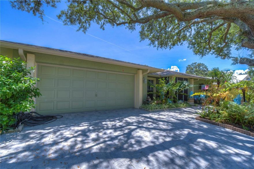 This beautiful 3 bedroom, 2 bath home with a bonus office / potential 4th bedroom is the perfect paradise! The tropical screened pool, pergola covered jacuzzi, and gorgeously gardened yard provides peace and calm for all who enter. Inside the home, the split floorplan features a large master bedroom and office on one side and 3 bedrooms and a bathroom on the other. There are two living and dining areas, perfect for plenty of space to spread out! From the kitchen, office, and living room, your view extends out to the beautiful crystal blue screened pool area with breathtaking botanical beauty! As an added benefit, this home features fully paid off solar panels (43 of them to be exact), saving over $150 a month on your electric bill! Current owners pay just over $20 a month in electric! Plus the enlarged driveway has just recently been upgraded to pavers! This large home is perfect to suit a variety of needs, from families, to those to love to entertain and host gatherings, to those who love quiet, peaceful solitude. Conveniently located close to I4, I275, US301, Tampa, Brandon Mall, restaurants, entertainment, and more!